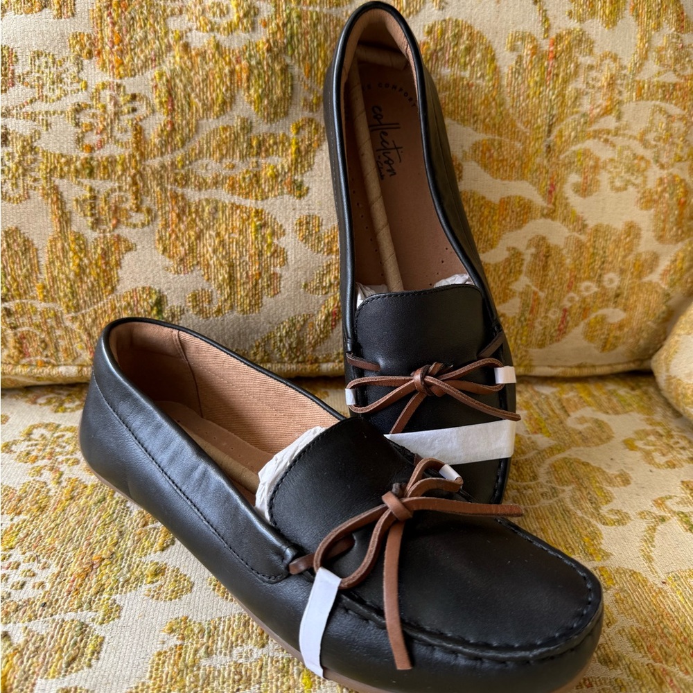 Clarks Black Moccasins with Brown Accents